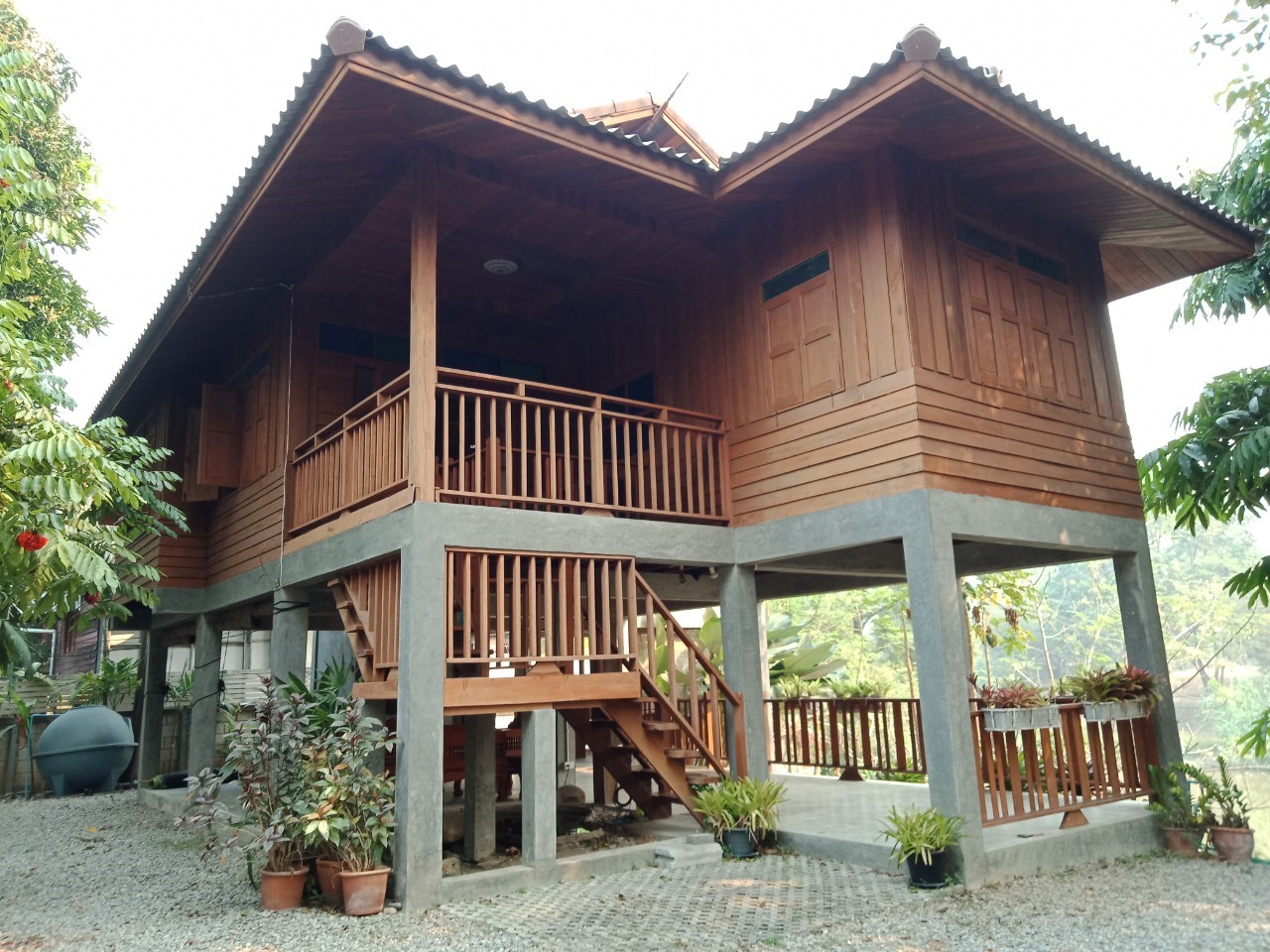 hr3338 thai wooden house for rent next to ping river chiang mai